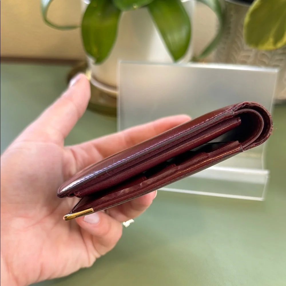 Cartier Bordeaux bifold Leather Wallet with Gold Accents